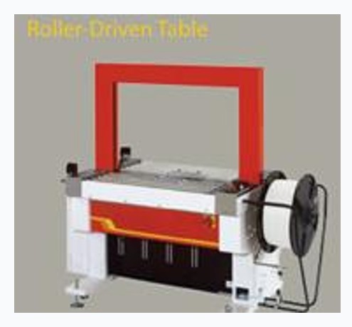 Transpack Tauris Transit TP-601A roller-driven and TP-601B belt-driven strapping machines, side by side